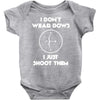 i don't wear bows Baby Onesie