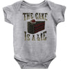the cake is a lie Baby Onesie