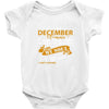 I'm a december woman I was born with my heart Baby Onesie