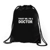 trust me i'm a doctor Drawstring Bags