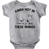 kinda hot in these rhinos Baby Onesie