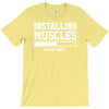 installing muscles funny T-Shirt