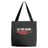 getting drunk Tote Bags