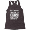 keep in mind that im an artist Racerback Tank