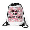 Never Say Game Over Drawstring Bags