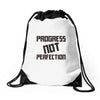 progress not perfection Drawstring Bags