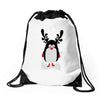 christmas penguin Drawstring Bags