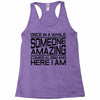 once in a while someone amazing comes along Racerback Tank