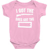 she's got the rack Baby Onesie