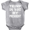 trump is not my president Baby Onesie