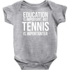 education is important but tennis is more importanter Baby Onesie