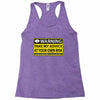 at your own risk Racerback Tank