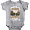 Never Underestimate A Man Who Watches The 100 And Was Born in December Baby Bodysuit