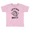 let's taco bout it Toddler T-shirt
