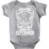 Never Underestimate Dog Rescuer Who Was Born September Baby Onesie