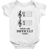13/8 6/4 These Are Difficult Times Baby Onesie