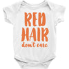 red hair dont care Baby Onesie
