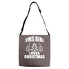 this girl loves christmas Adjustable Strap Totes