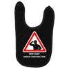 body under construction road sign Baby Bibs