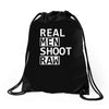 real men shoot raw funny photography Drawstring Bags