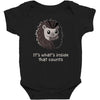 it's what's inside that counts Baby Bodysuit