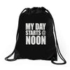 my day starts at noon Drawstring Bags