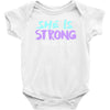 she is strong Baby Bodysuit