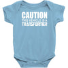 caution this vehicle is a transformer Baby Onesie