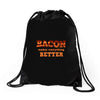 bacon makes everything better Drawstring Bags