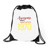 awesome since november 1970 Drawstring Bags