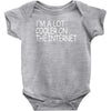 i'm a lot cooler on the internet Baby Onesie