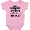never underestimate an old man who was born in march Baby Onesie