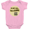 im a classic 60th birthday gifts Baby Onesie