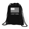 i don't kneel Drawstring Bags