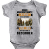 Never Underestimate A Man Who Watches The 100 And Was Born in December Baby Bodysuit