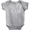 breath in the ocean Baby Onesie