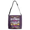 i am a december women Adjustable Strap Totes