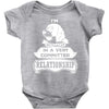 I Am Beagle Actually In A Very Commited Relationship Baby Onesie