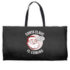 santa claus is coming Weekender Totes