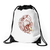 banana eating lion Drawstring Bags
