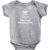 Keep Calm and trust me, I'm the Doctor Baby Onesie