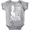 you aint getting nun Baby Onesie