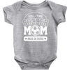 paid in hugs Baby Onesie