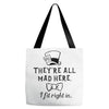 They're All Mad Here. I fit right in Tote Bags