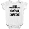 never underestimate an old man who was born in january Baby Onesie