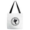 paddy's community college Tote Bags