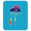 giraffe reaching up with its long neck to eat leaves off branches from Mousepad