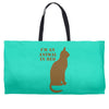 im an animal in bed Weekender Totes