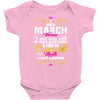 i am a march women Baby Onesie