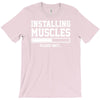 installing muscles funny T-Shirt